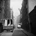 Vans unloading outside warehouses in a street off Ludgate Hill in the City of London Image preview