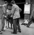 Young boys collecting money in a tin for their Guy Fawkes effigy Image preview
