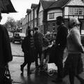 Two teenage boys stand next to a homemade Guy Fawkes on the street opposite Willesden Public Library Image preview