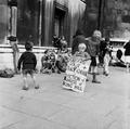 Child protester with billboard highlighting evictions at the Kings Hill hostel Image preview