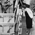 Woman browsing magazines at a newsagents in Golders Green Image preview