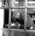 Filling out football coupons at the Post Office Image preview