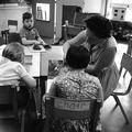 A group of children during a junior art lesson photographed at the John F Kennedy Centre for training and education of children with severe disability, West Ham Image preview