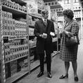 Woman shopper with a shop assistant at a Wholesale Market Image preview