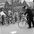 A policeman trains school children for their National Cycling Proficiency test at St. Mary's School, Finchley Image preview
