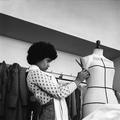 A black female student works on a dressmaker's mannequin at Southgate Technical College Image preview