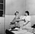 Toddler being weighed at the Coram Gardens Day Nursery Image preview