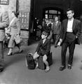 Boy waiting to return to boarding school, Kings Cross Station Image preview