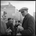 A trader at Petticoat Lane street market Image preview