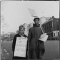 A man and boy at a Christmas 'Campaign for Nuclear Disarmament' vigil Image preview