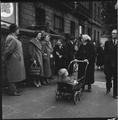 A group outside Kennistoun House watching a rent protest, Kentish Town Image preview