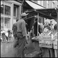 A man at a fresh produce stall, Kensington Image preview