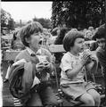 Children watch a magic show, Kilburn Grange Park Image preview