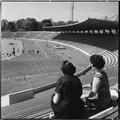 Spectators on the Stadium Arena terraces, National Recreation Centre Image preview