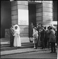 Posing for wedding photographs outside Camden Town Hall, Camden Image preview