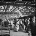 Rail passengers on a platform in Waterloo Station Image preview