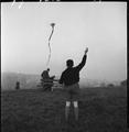 A boy flies a kite on the summit of Parliament Hill, Hampstead Heath Image preview