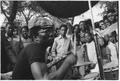 Band playing music to crowd at fun fair, Brent Cross Image preview