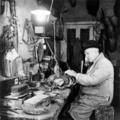 Edward Gerrard working to preserve an animal skeleton Image preview