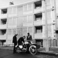 Men with a motorbike outside Queen's Crescent, St Pancras Image preview