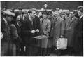 A magician performs card tricks at Petticoat Lane street market Image preview