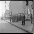Skilled workers in the tailoring trade gather on a London street Image preview
