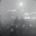 Traffic in smog at night Image preview