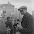 A trader at Petticoat Lane street market Image preview