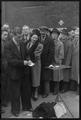 A magician performs card tricks at Petticoat Lane street market Image preview