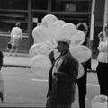 Balloon seller at the Bank Holiday fun fair, Hampstead Image preview